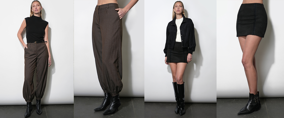 Up-close image of white, high-waist trousers being worn.
