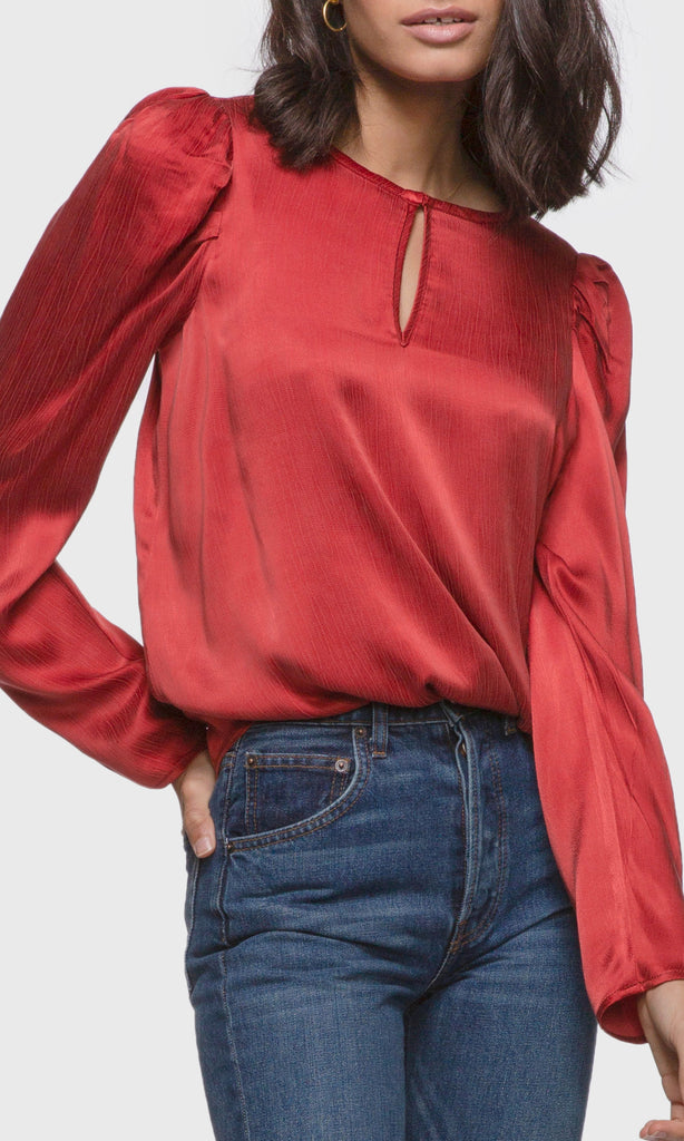 Women's red puffy long sleeve keyhole blouse