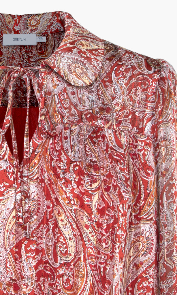 Detailed shot of paisley print blouse